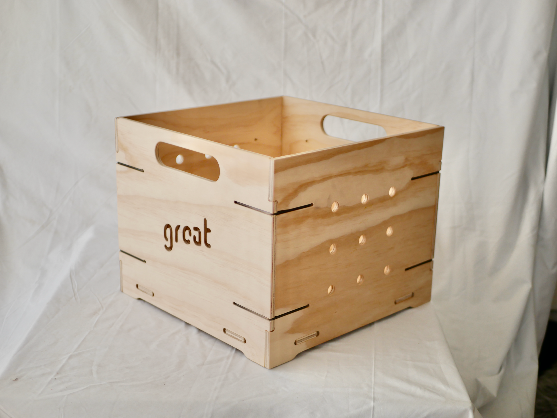 NZ-made vinyl storage box with natural plywood, beeswax finish, and steel reinforcement.